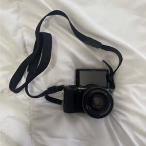 Sony Compact Black Digital Camera with Adjustable Strap